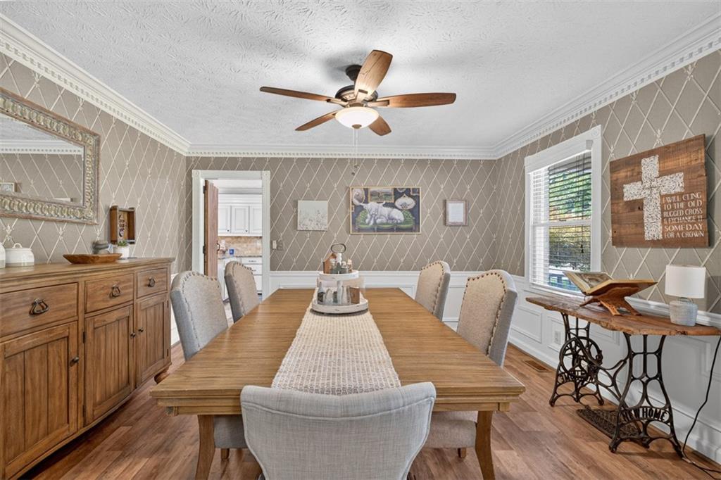 2380 Camp Mitchell Road Grayson, GA 30017 - Photo 8 of 56 a living room with furniture and a large window