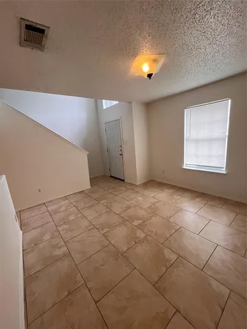 a view of a livingroom with wooden floor