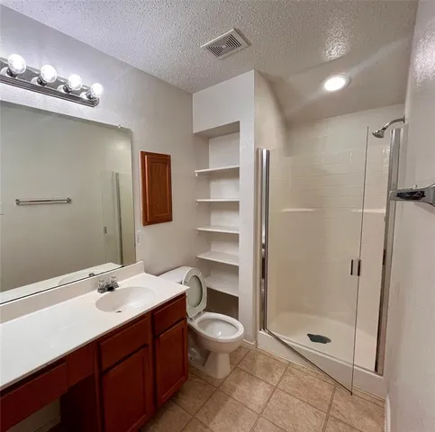 a bathroom with a sink a large mirror and a bathtub