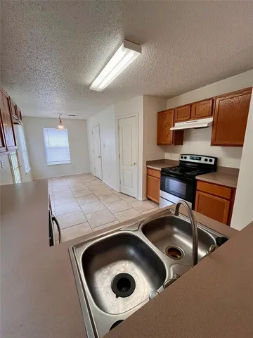 a living room with a fireplace