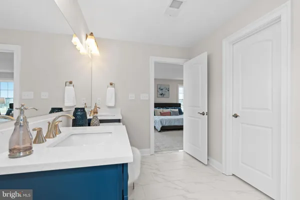 a white bath tub sitting next to a window