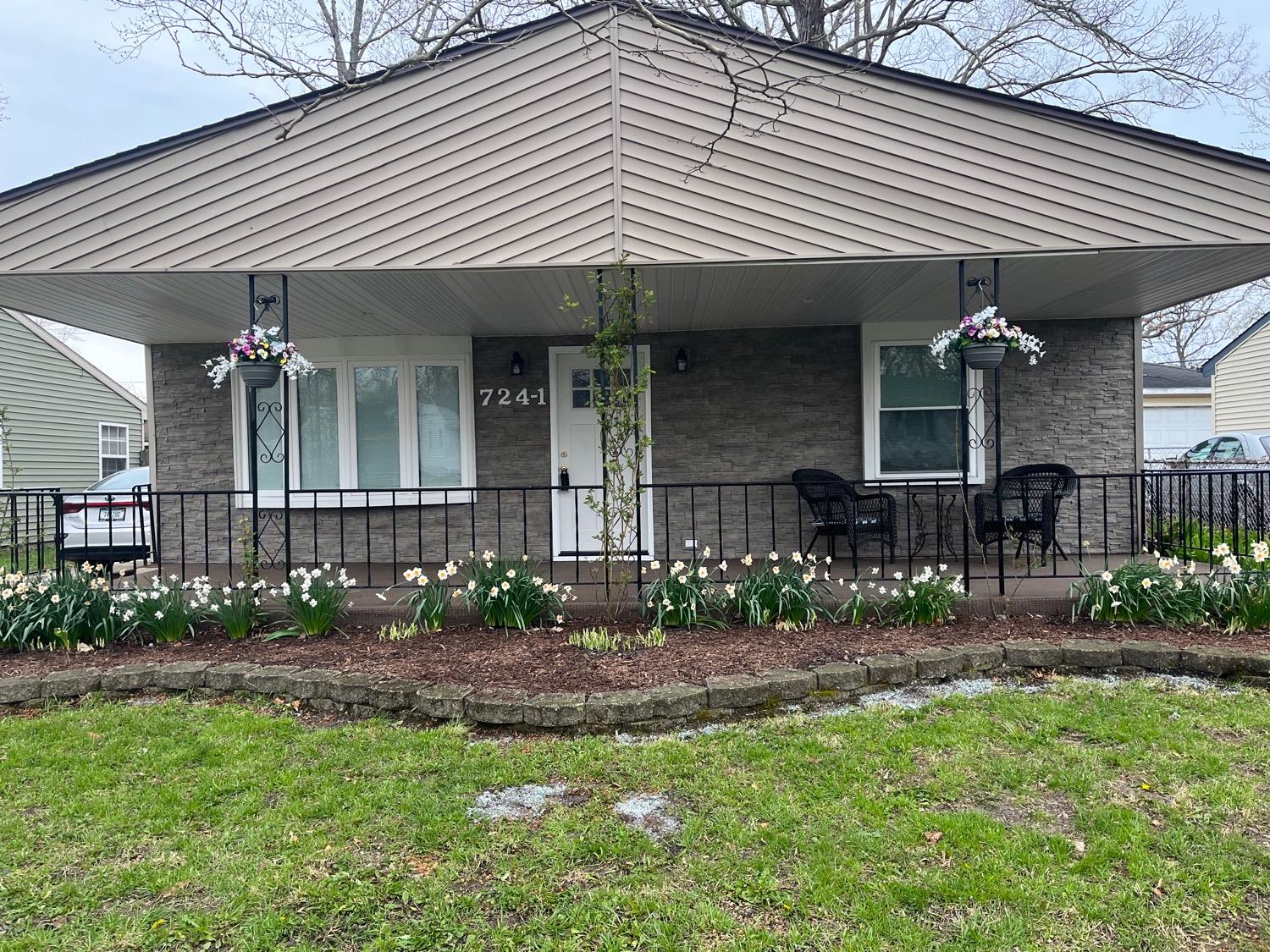 705-1 Imperial Road Valparaiso, IN 46385 - Photo 1 of 27 a front view of a house with garden
