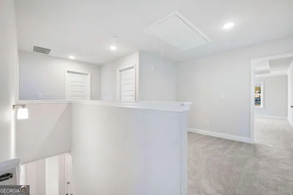 a bathroom with a sink toilet and a mirror