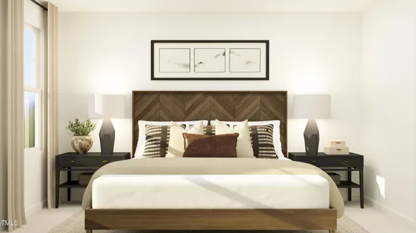 a bedroom with a bed and painting on the wall