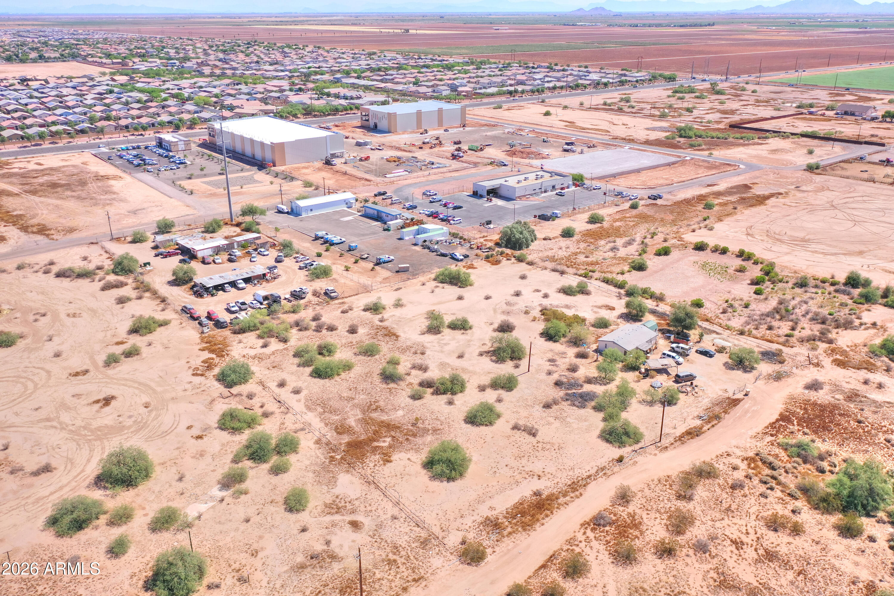 40526 West 7 Ranch Road Maricopa, AZ 85138 - Photo 6 of 14 an aerial view of residential houses with outdoor space