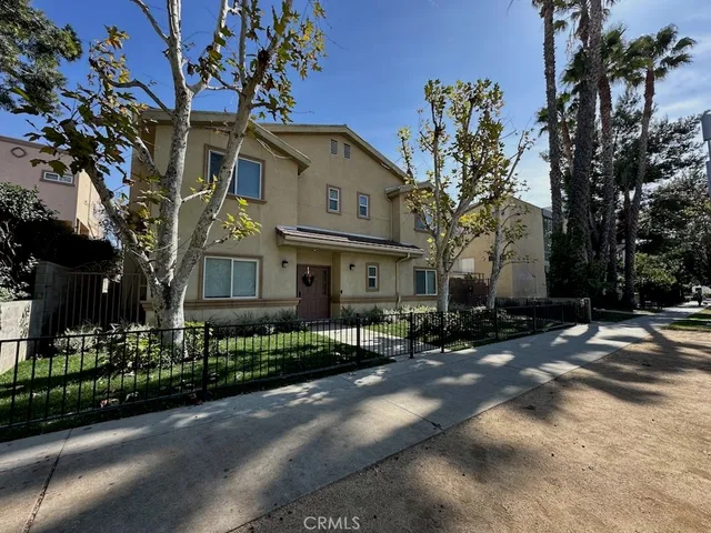 a view of a building with a street