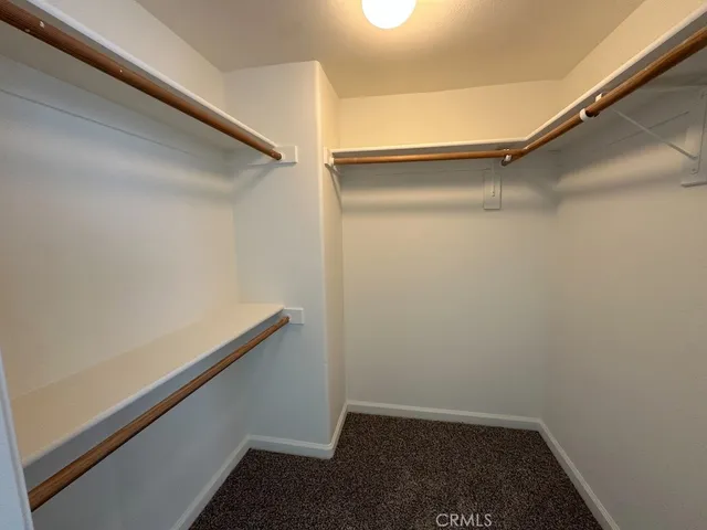 a view of an empty room and windows