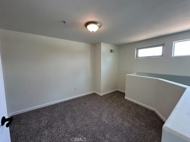 a view of an empty room with window