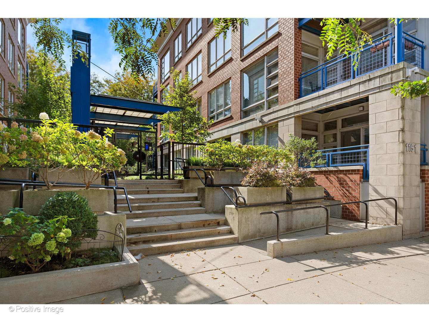 1151 West Washington Boulevard, Unit 136 Chicago, IL 60607 - Photo 1 of 19 a view of a building with potted plants