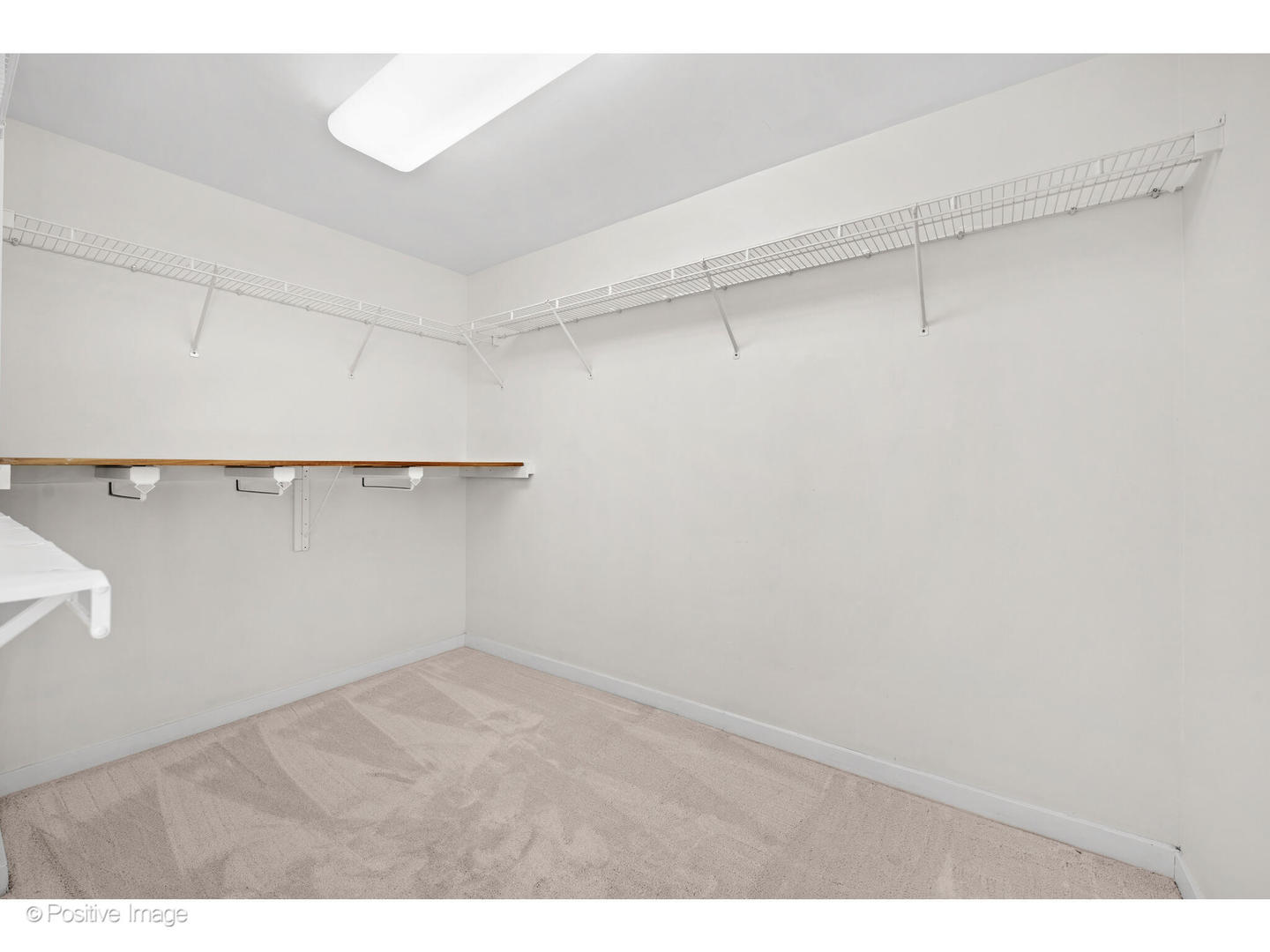 1151 West Washington Boulevard, Unit 136 Chicago, IL 60607 - Photo 12 of 19 a view of an empty walk in closet