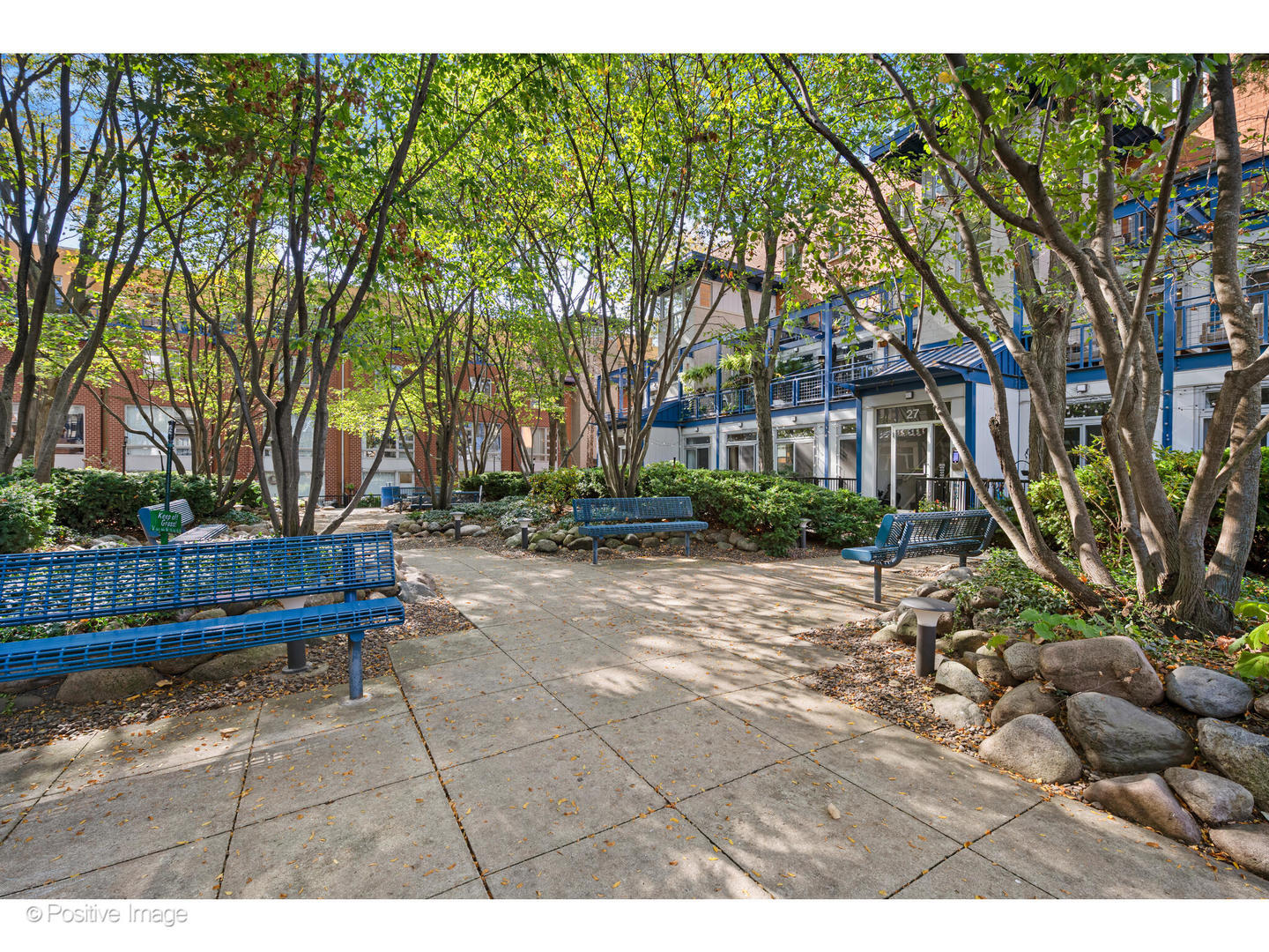 1151 West Washington Boulevard, Unit 136 Chicago, IL 60607 - Photo 18 of 19 a view of backyard with table and chairs and potted plants