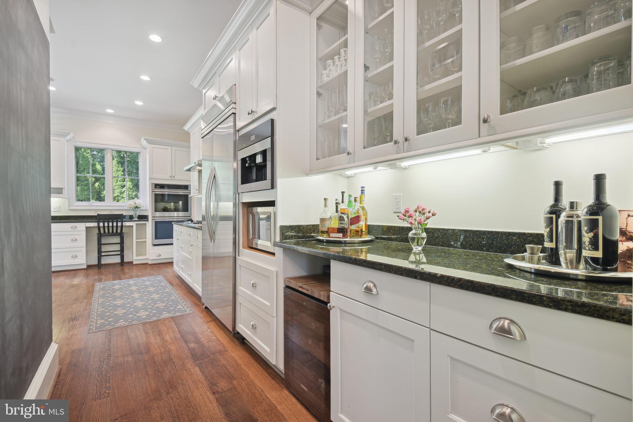 4317 Rosedale Avenue Bethesda, MD 20814 - Photo 20 of 46 Bar Area with glass-front cabinets