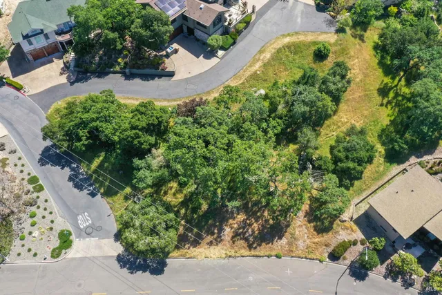 an aerial view of residential house with outdoor space