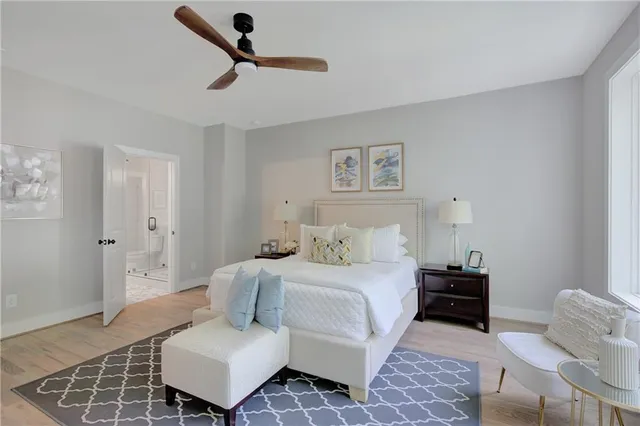 a bedroom with a bed and furniture