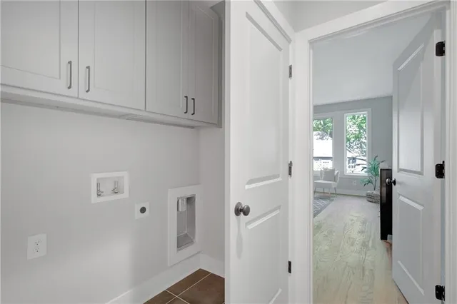 a view of a livingroom and a hallway