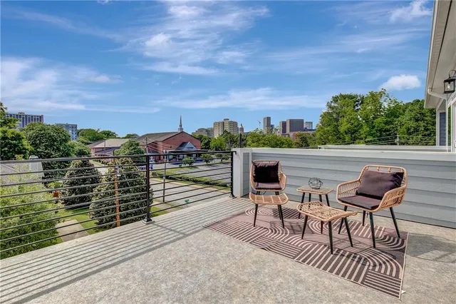 a view of a chairs and table on the terrace