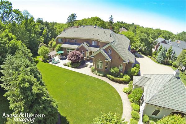 32 Clark Road Andover, MA 01810 - Photo 2 of 28 an aerial view of a house with swimming pool and garden