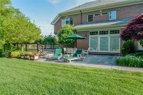 32 Clark Road Andover, MA 01810 - Photo 26 of 28 a view of a house with backyard sitting area and sitting area
