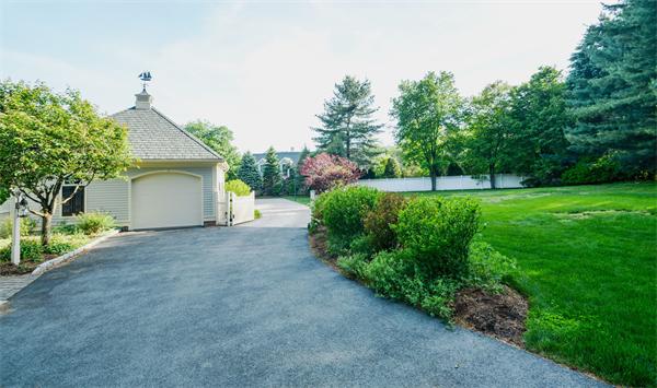 32 Clark Road Andover, MA 01810 - Photo 27 of 28 a view of a house with backyard and garden