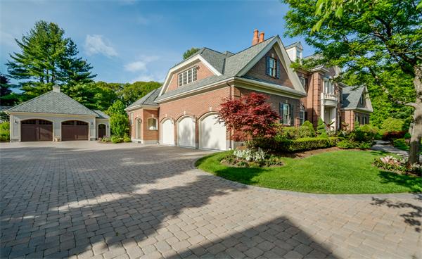 32 Clark Road Andover, MA 01810 - Photo 5 of 28 a front view of a house with a garden
