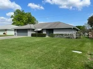 a front view of house with yard