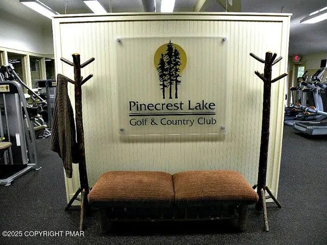 a bedroom with a bed and a table