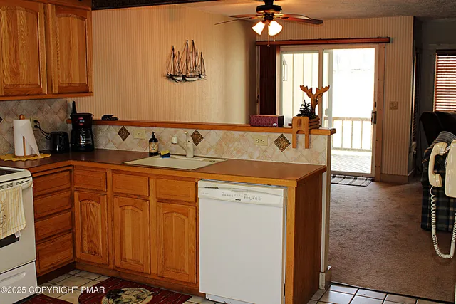 a bathroom with a sink a vanity and a mirror