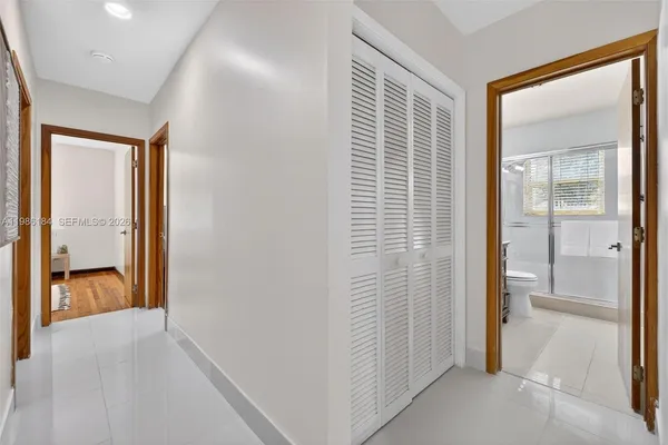 an aerial view of a house with outdoor space swimming pool seating area and yard