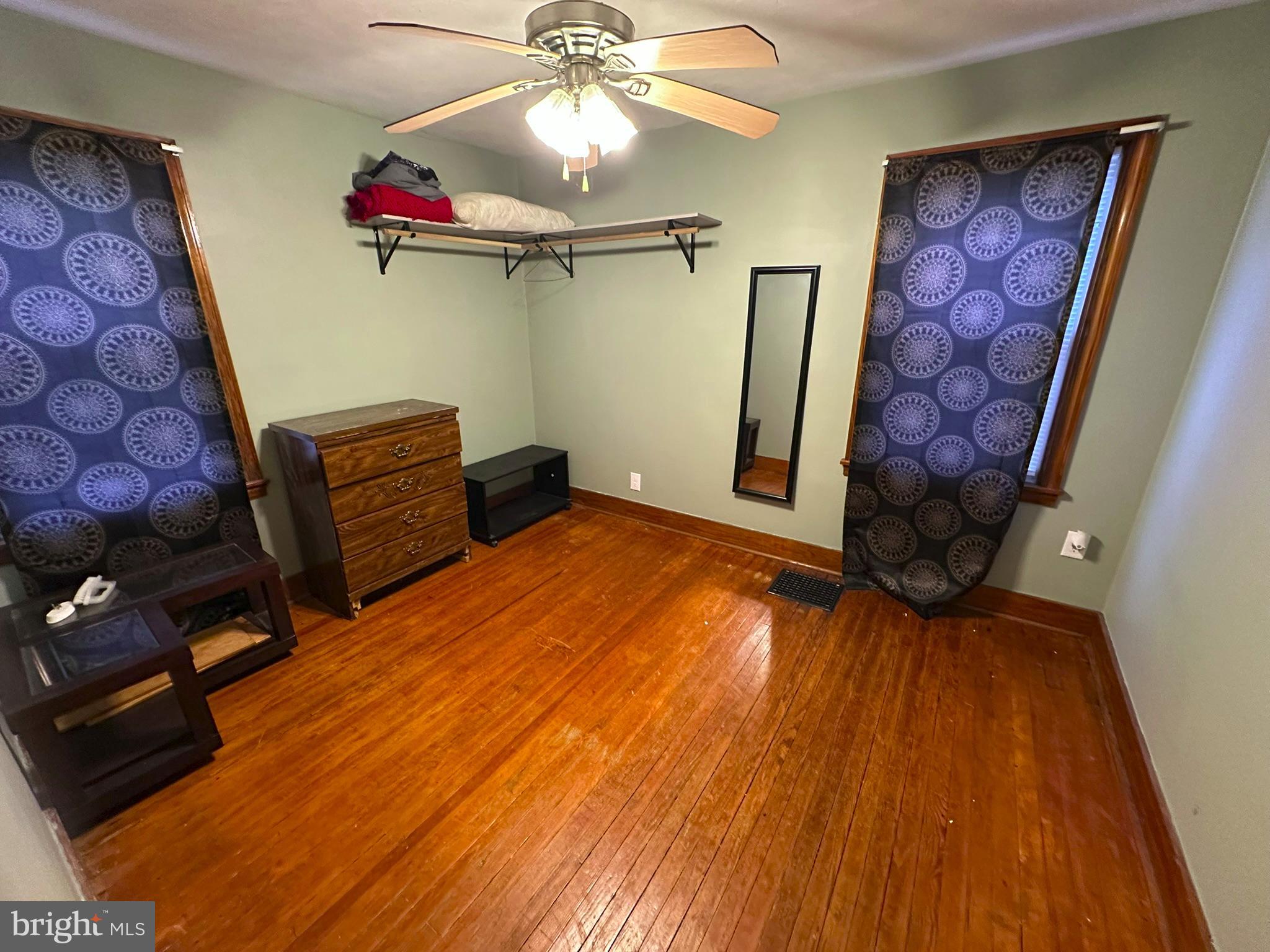 407 Upper Snake Spring Road Everett, PA 15537 - Photo 16 of 58 a view of an empty room with a window