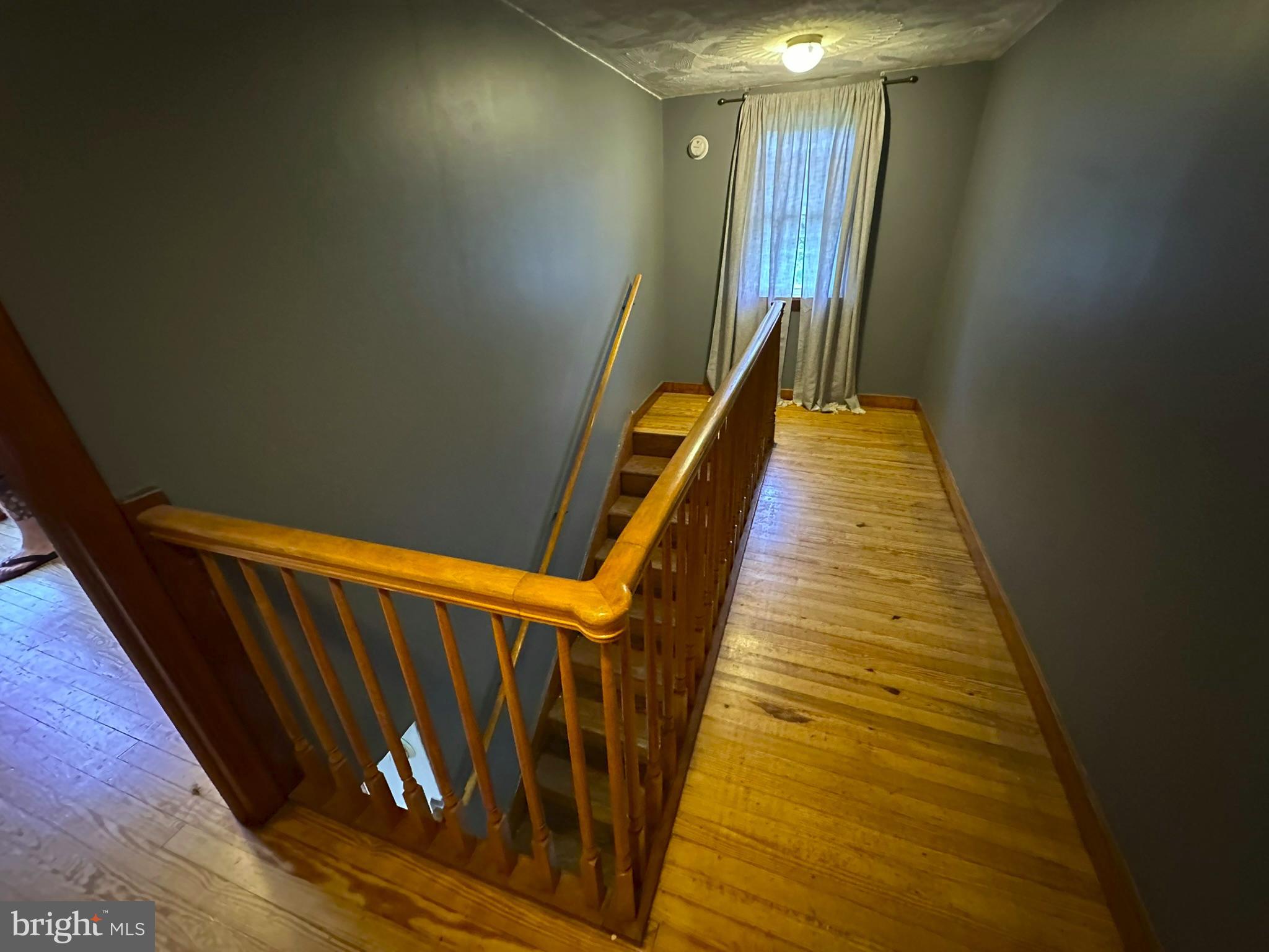 407 Upper Snake Spring Road Everett, PA 15537 - Photo 20 of 58 a view of balcony with stairs