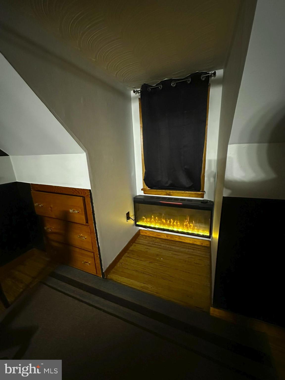 407 Upper Snake Spring Road Everett, PA 15537 - Photo 23 of 58 a view of room with wooden floor and white wall