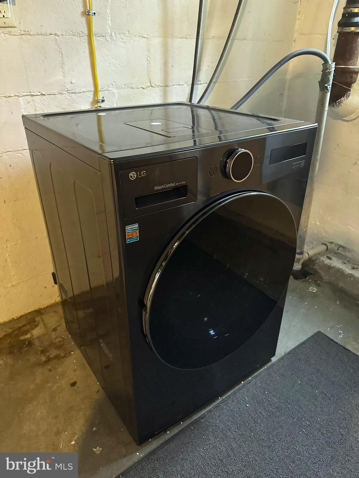 407 Upper Snake Spring Road Everett, PA 15537 - Photo 38 of 58 a utility room with dryer and washer