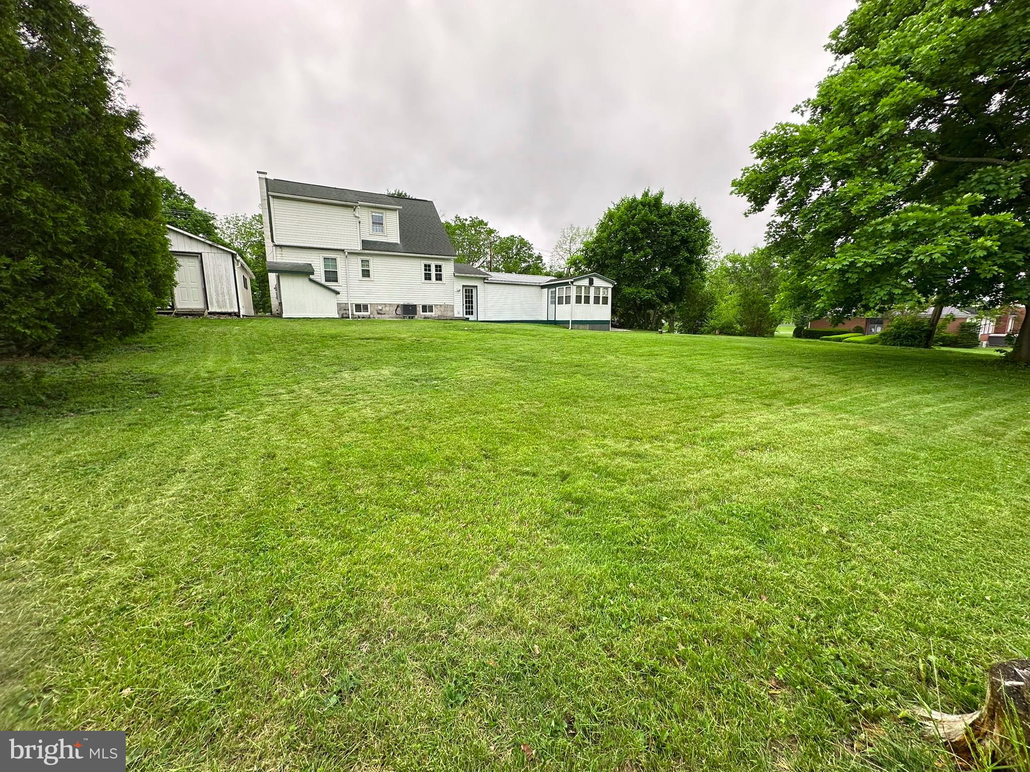 407 Upper Snake Spring Road Everett, PA 15537 - Photo 43 of 58 a house view with garden space