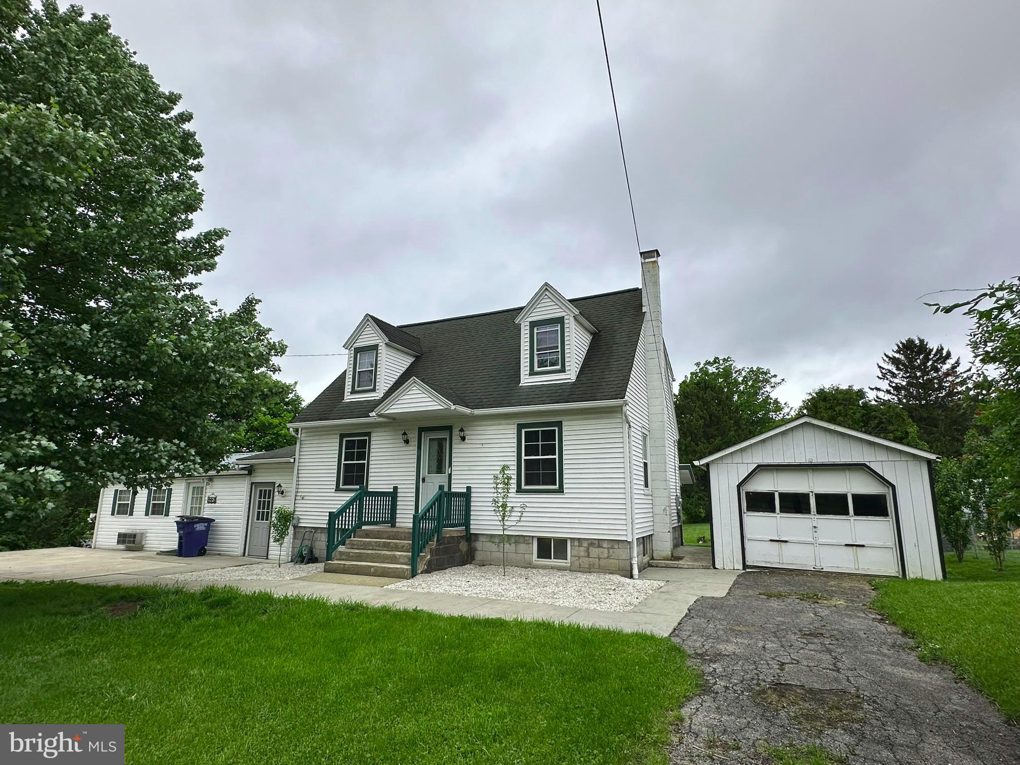 407 Upper Snake Spring Road Everett, PA 15537 - Photo 48 of 58 a front view of a house with a yard