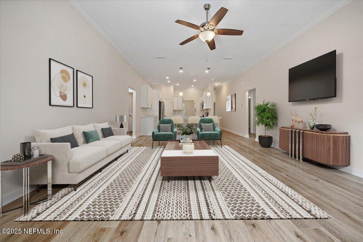 3127 Tiger Hole Road Jacksonville, FL 32216 - Photo 8 of 27 10-Family Room to Kitchen Virtually Stag