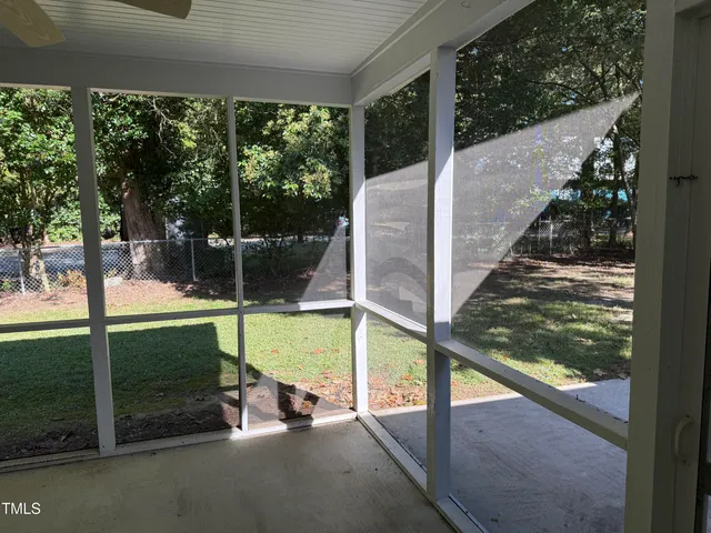 a view of swimming pool from a balcony