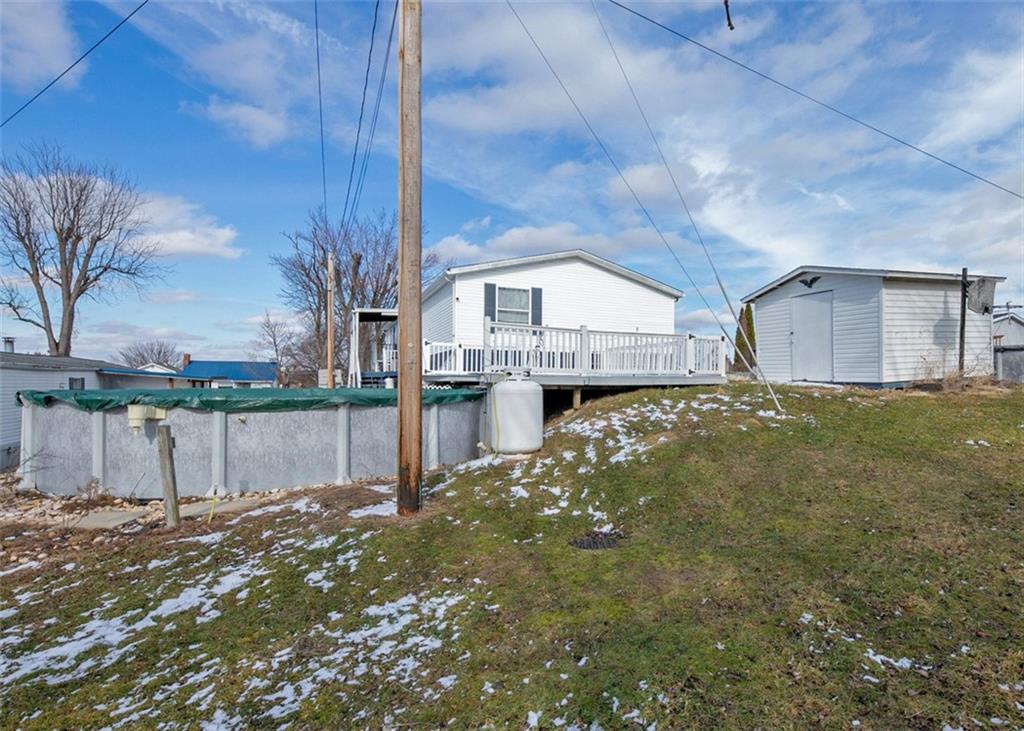 107 Indigo Road Mount Pleasant, PA 15666 - Photo 5 of 36 a view of a house with a yard