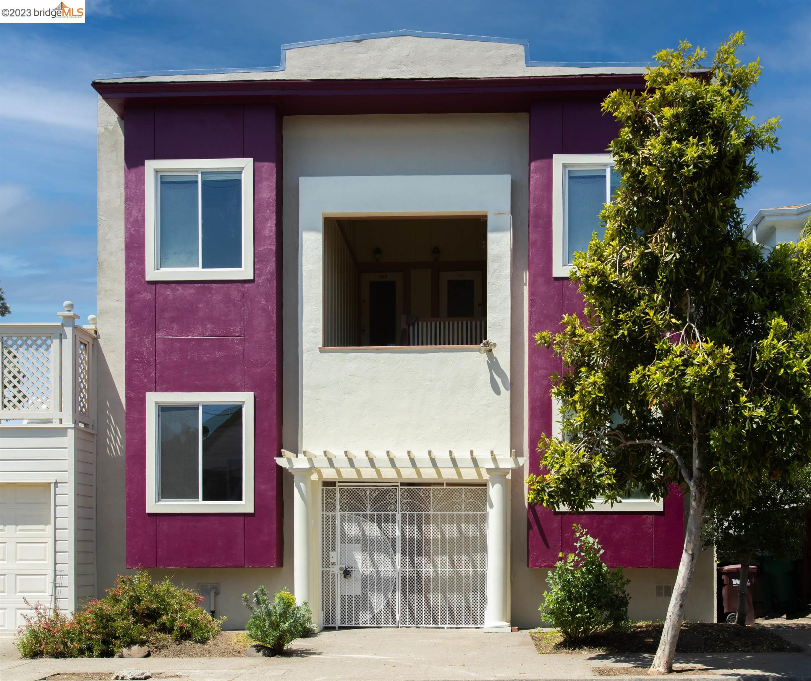 a front view of a house with a garage