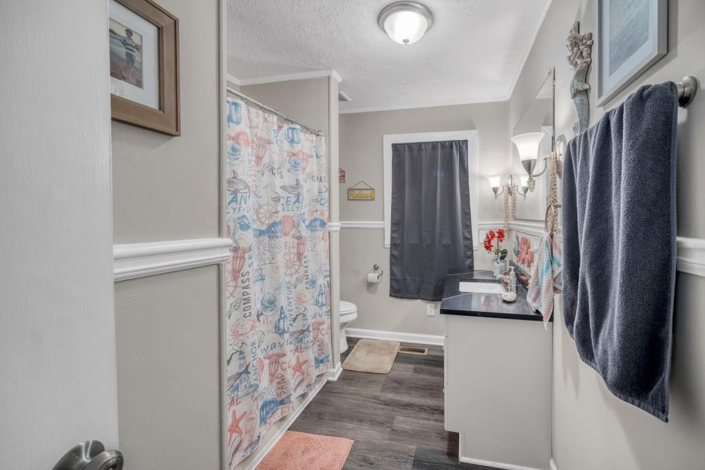 83 Summit Ridge Circle Southeast Cartersville, GA 30120 - Photo 20 of 32 a bathroom with a shower and a sink