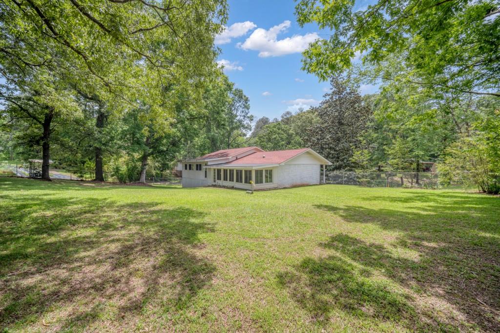 83 Summit Ridge Circle Southeast Cartersville, GA 30120 - Photo 25 of 32 a green field with lots of trees