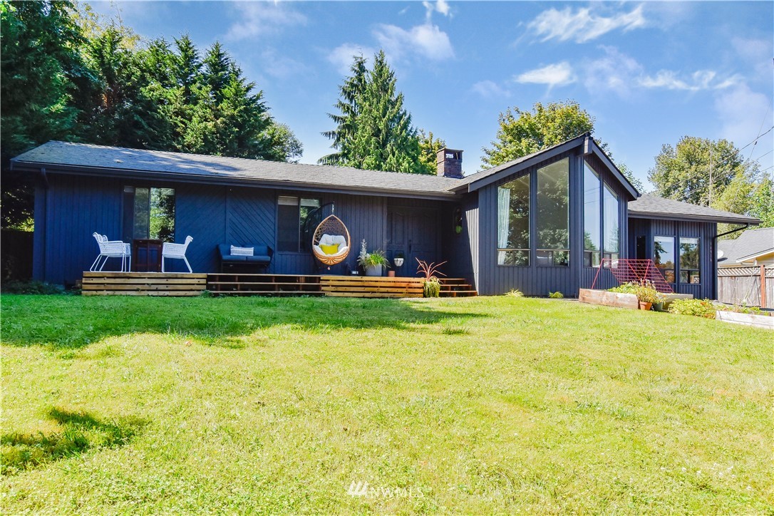 14516 Connelly Road Snohomish, WA 98296 - Photo 2 of 40 a front view of house with outdoor seating and yard