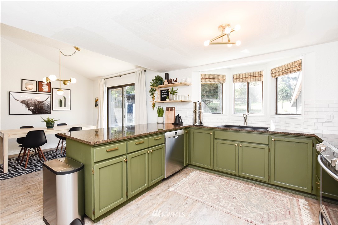 14516 Connelly Road Snohomish, WA 98296 - Photo 13 of 40 a kitchen with sink and cabinets