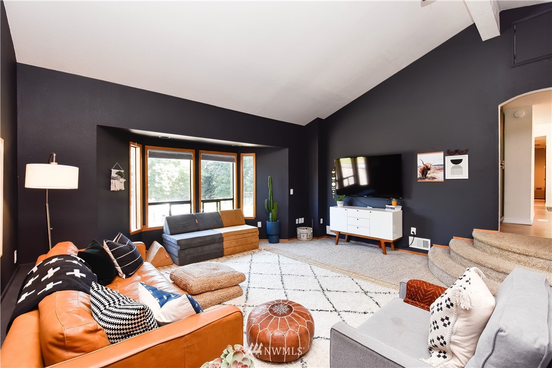 14516 Connelly Road Snohomish, WA 98296 - Photo 19 of 40 a living room with furniture ceiling fan and a window