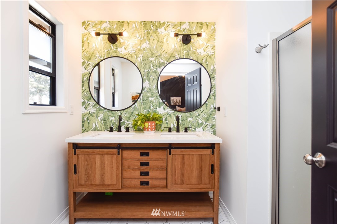 14516 Connelly Road Snohomish, WA 98296 - Photo 26 of 40 a bathroom with a sink and a mirror