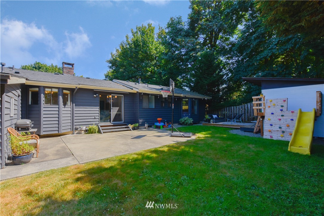 14516 Connelly Road Snohomish, WA 98296 - Photo 37 of 40 a view of a house with backyard and sitting area