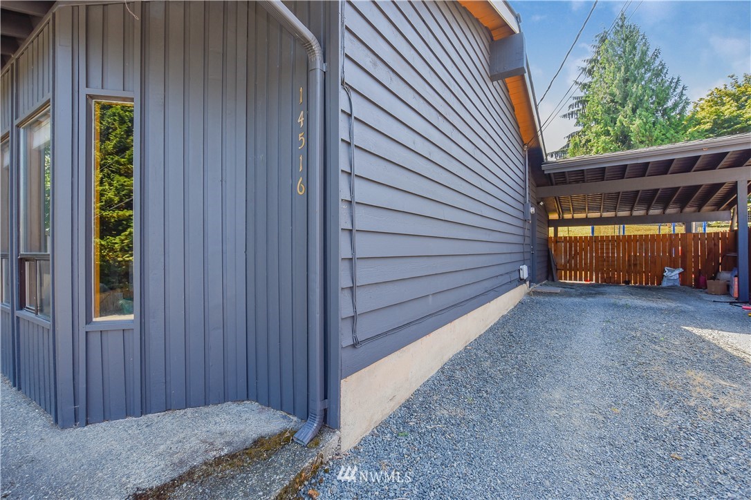 14516 Connelly Road Snohomish, WA 98296 - Photo 39 of 40 a view of a house with a backyard