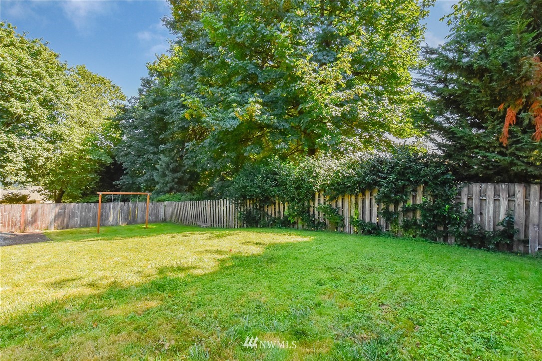 14516 Connelly Road Snohomish, WA 98296 - Photo 40 of 40 a view of a backyard with a small cabin