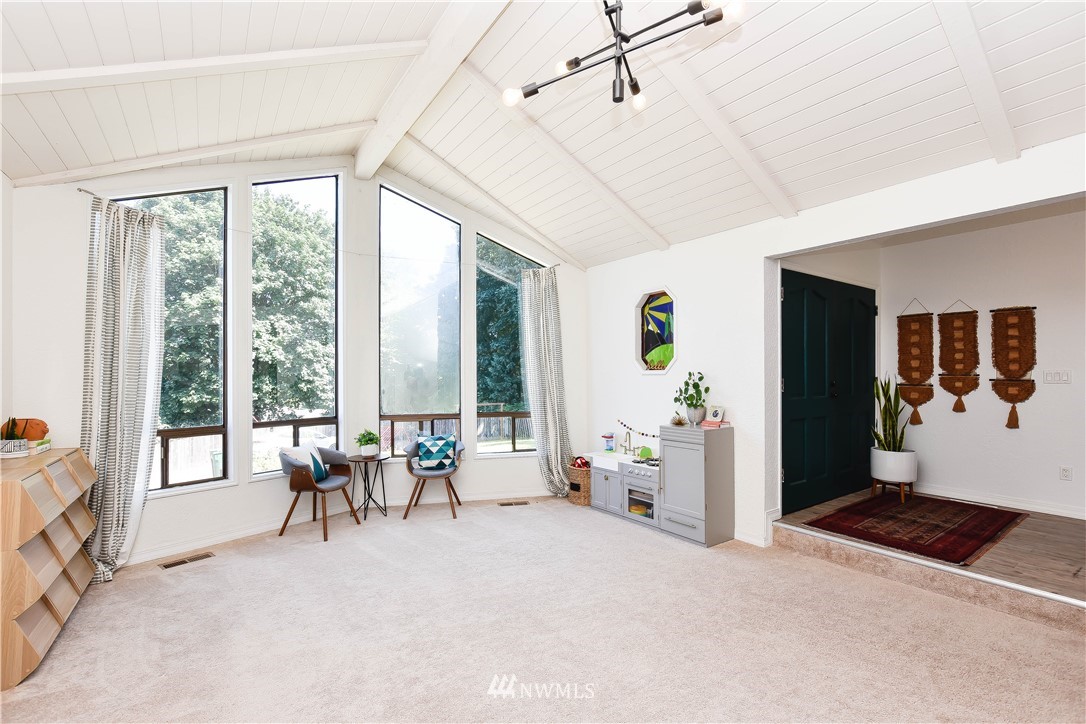 14516 Connelly Road Snohomish, WA 98296 - Photo 6 of 40 a living room with furniture and large windows