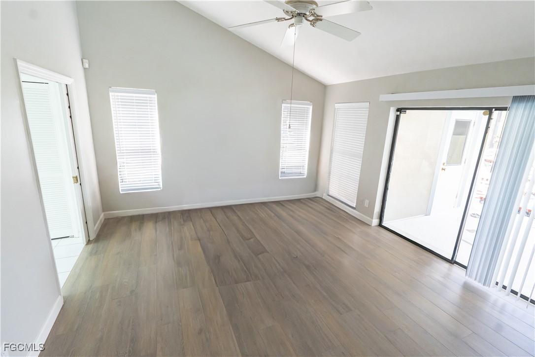 14557 Eagle Ridge Drive Fort Myers, FL 33912 - Photo 18 of 20 wooden floor in an empty room with a window