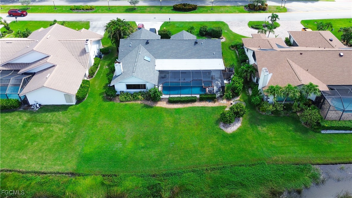 14557 Eagle Ridge Drive Fort Myers, FL 33912 - Photo 2 of 20 an aerial view of a house with a yard